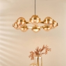 Ophira 8 Light Pendant Antique Gold and Amber Ribbed Glass