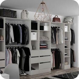 Fitted wardrobe interior with hanging rails, drawers and open shelving