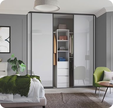 Made to measure fitted wardrobe in grey with an open shelving section